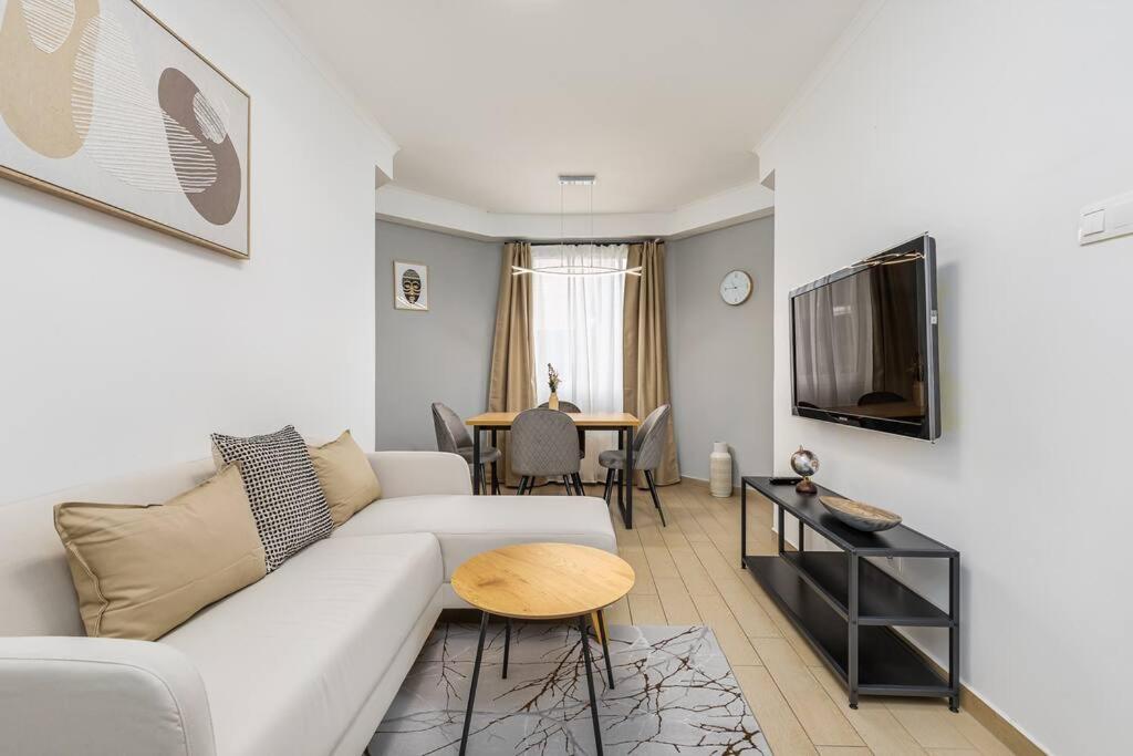 Televízia a/alebo spoločenská miestnosť v ubytovaní Venus Apartments - Synagogue I