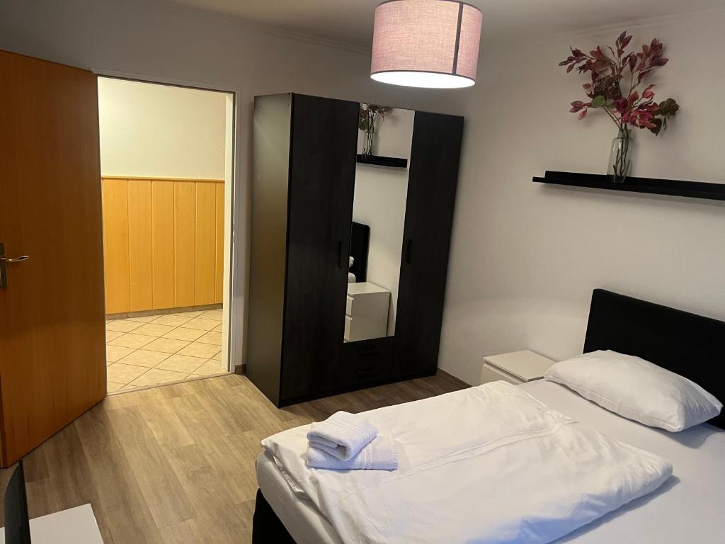 Postel nebo postele na pokoji v ubytování Pharos zur Seeve