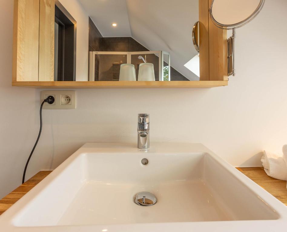 Koupelna v ubytování L'Antre d'Eux - Suite avec sauna et jacuzzi