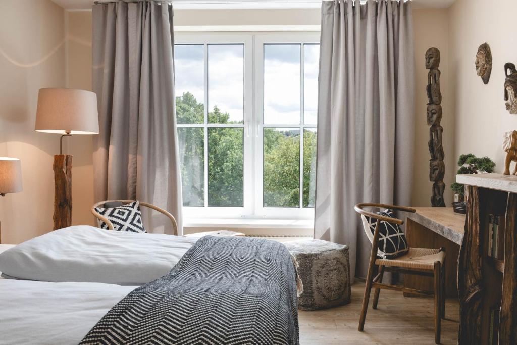 Postel nebo postele na pokoji v ubytování Sunderland Hotel