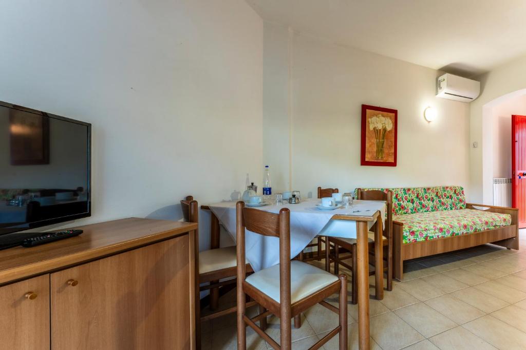 Postel nebo postele na pokoji v ubytování Giannella Beach Residence Apartment