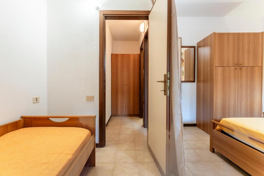 Postel nebo postele na pokoji v ubytování Giannella Beach Residence Apartment