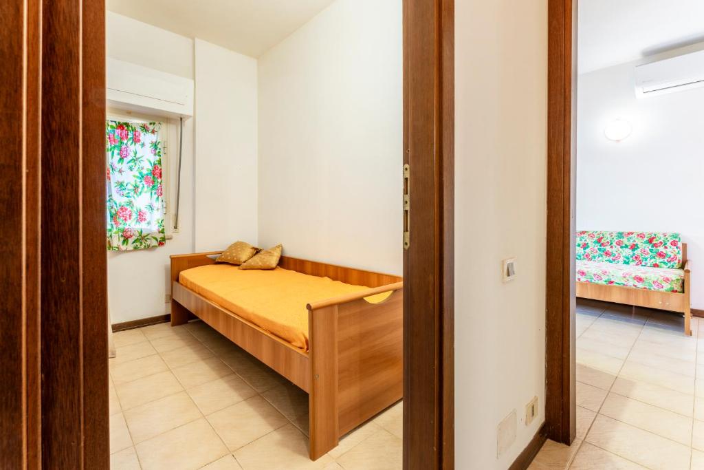 Postel nebo postele na pokoji v ubytování Giannella Beach Residence Apartment
