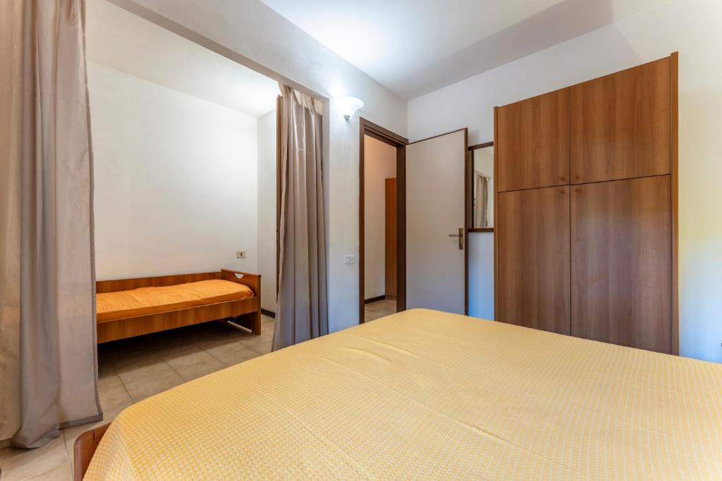 Postel nebo postele na pokoji v ubytování Giannella Beach Residence Apartment