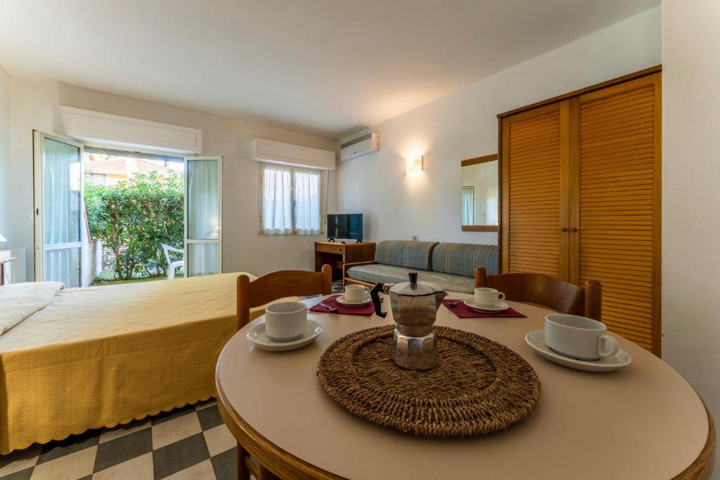 Postel nebo postele na pokoji v ubytování Giannella Beach Residence Apartment