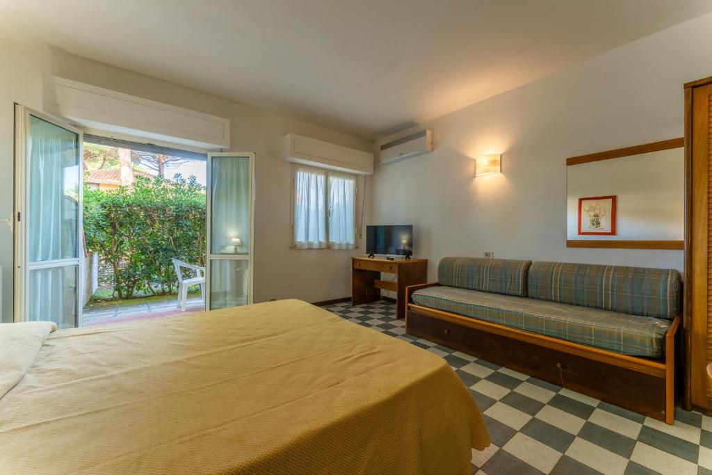 Postel nebo postele na pokoji v ubytování Giannella Beach Residence Apartment