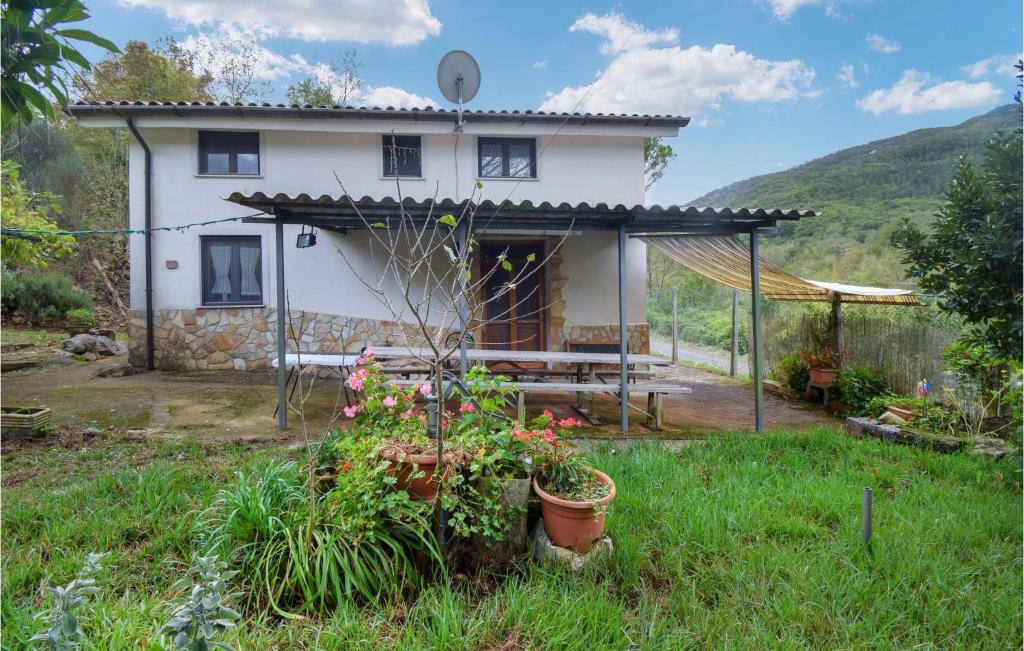 a house with a garden in front of it at Amazing Home In Campodimele With House A Panoramic View in Campodimele