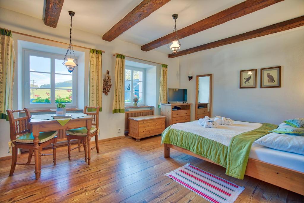 Postel nebo postele na pokoji v ubytování Apartmán-Hotel Jítravský Dvorec