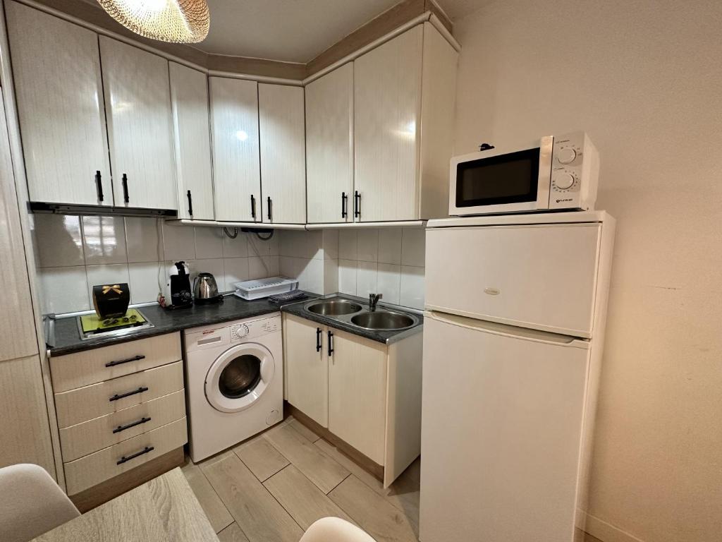 Kuchyň nebo kuchyňský kout v ubytování VER1 - Terraza - 1 dorm - Wifi - Centro a 100 metros - Playa a 600 metros