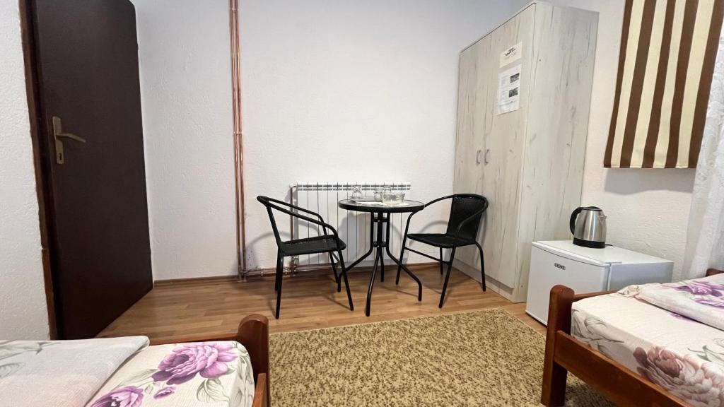 Postel nebo postele na pokoji v ubytování SNAM Rooms&Apartment