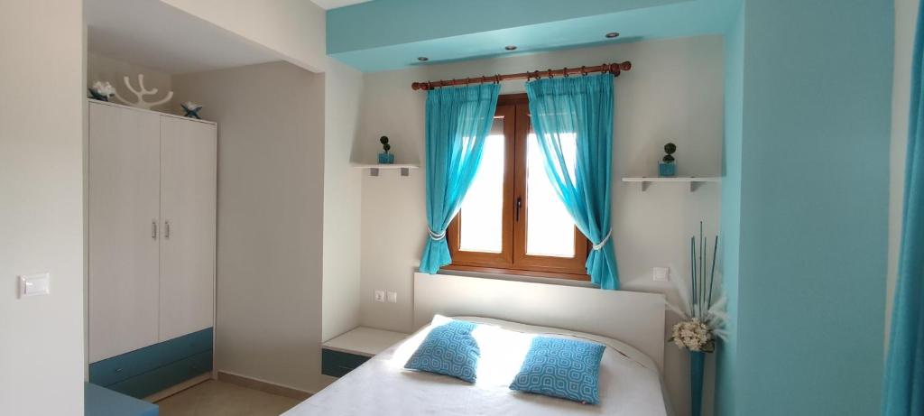 Voodi või voodid majutusasutuse Aracelia villas with private pool toas