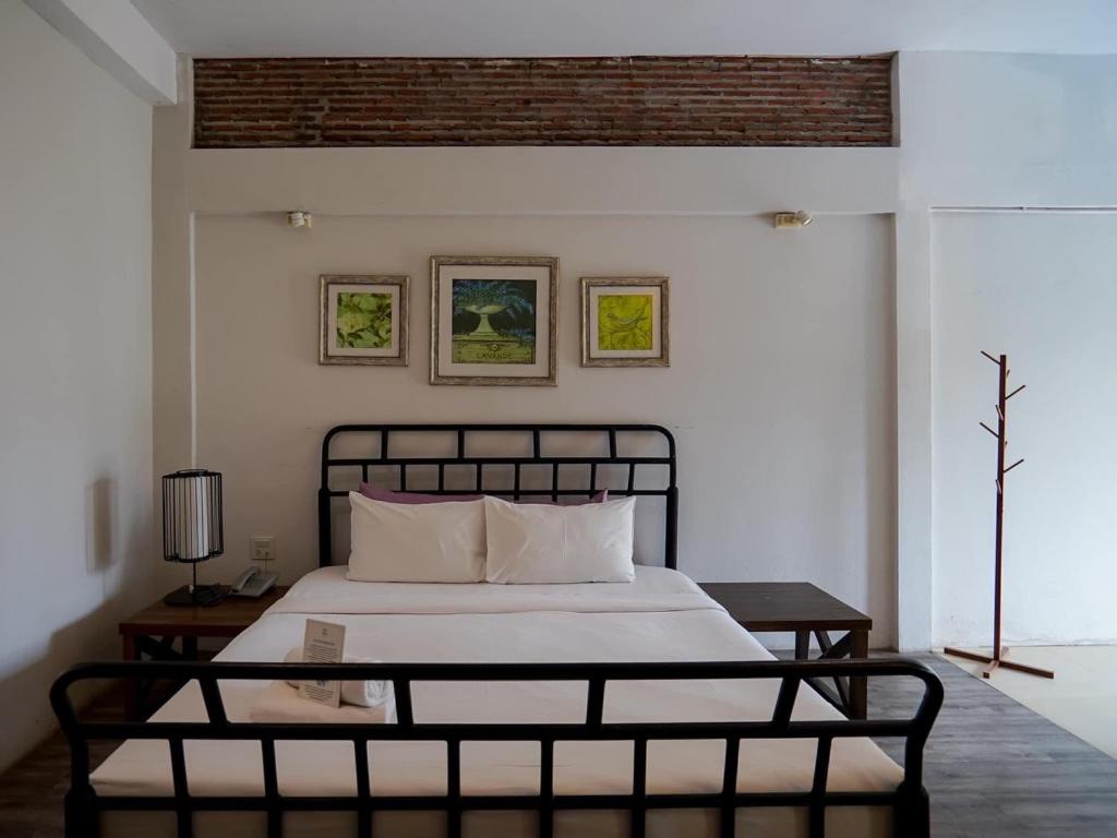 Postel nebo postele na pokoji v ubytování Hotel Toscana Trat