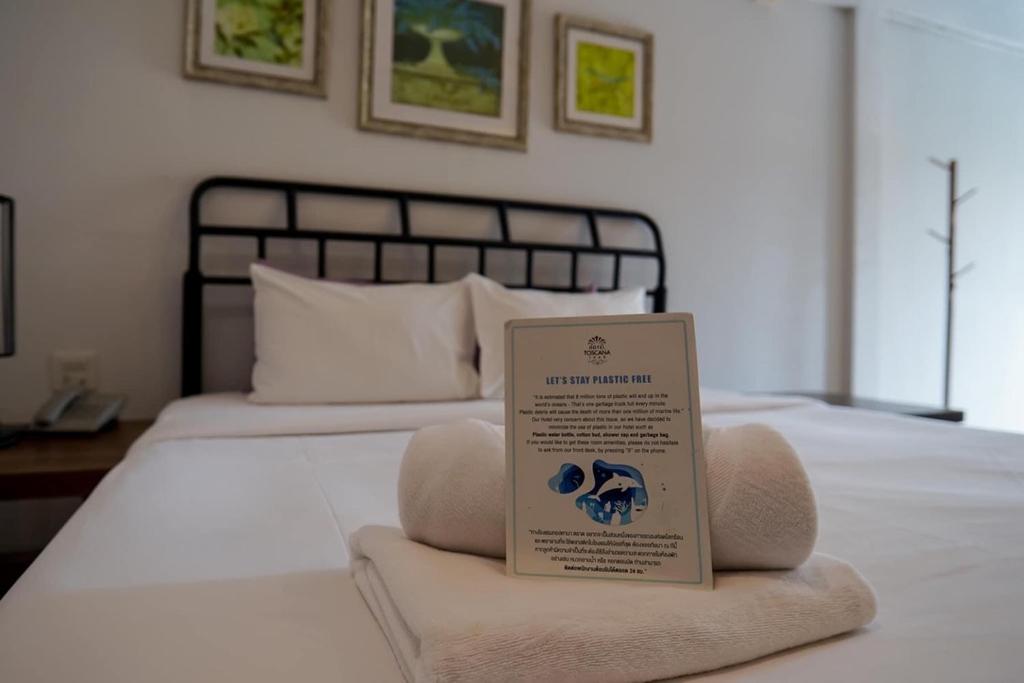 Postel nebo postele na pokoji v ubytování Hotel Toscana Trat
