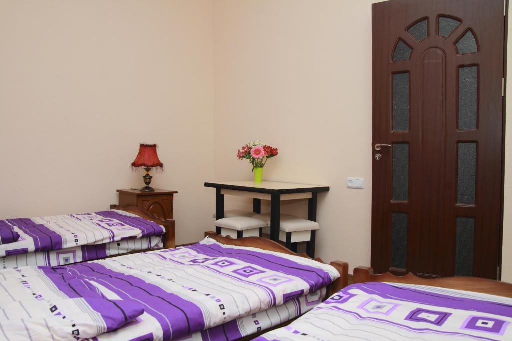 Postel nebo postele na pokoji v ubytování Inter Boutique Hotel