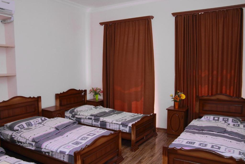 Postel nebo postele na pokoji v ubytování Inter Boutique Hotel