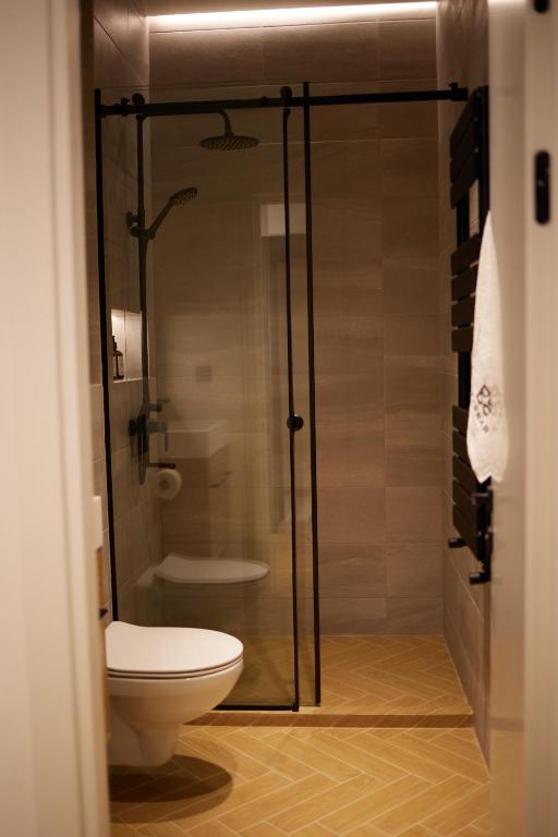 Koupelna v ubytování BARBAR APART HOTEL