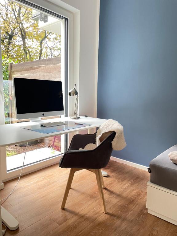 MiCasa OL - Deluxe Apartment mit Stil - Carport Stellplatz - Küche - WLAN - 3,7 KW Steckdose für E Auto - Terrasse - 7