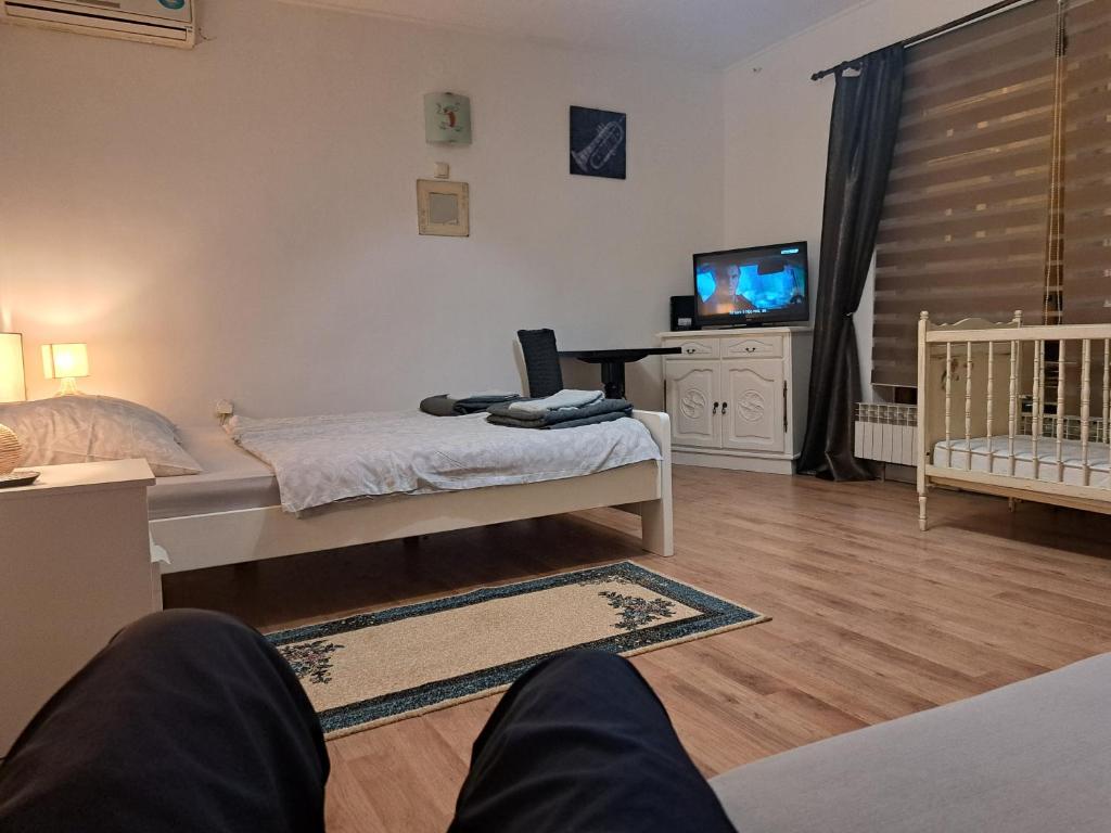 Posteľ alebo postele v izbe v ubytovaní Apartman Zuki