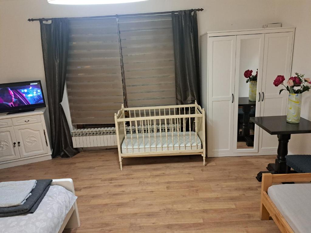 Posteľ alebo postele v izbe v ubytovaní Apartman Zuki