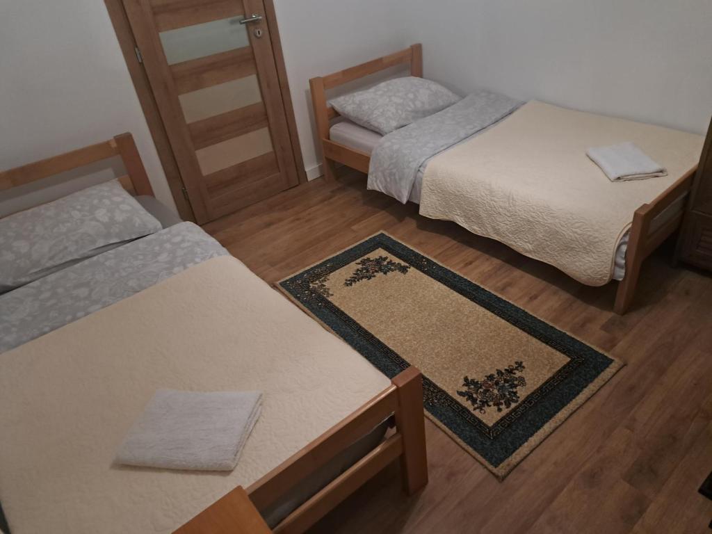 Posteľ alebo postele v izbe v ubytovaní Apartman Zuki