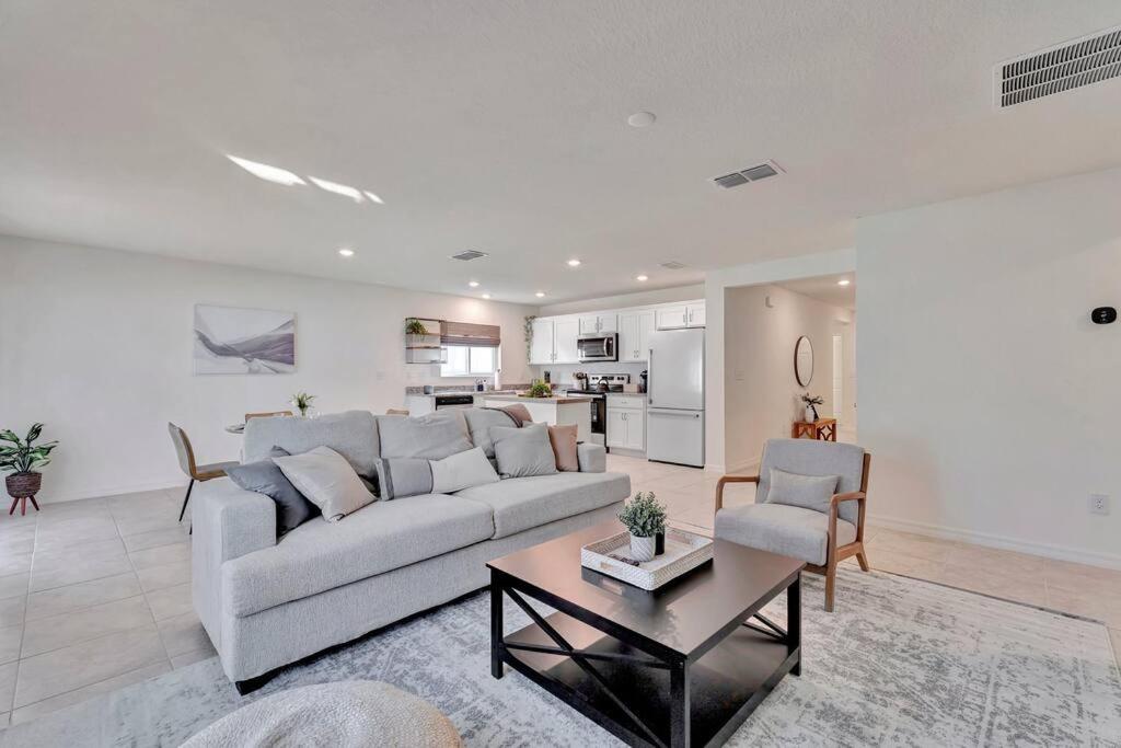 a living room with a couch and a coffee table at Serene Sarasota Residence * By th Beach & Airport! in Sarasota
