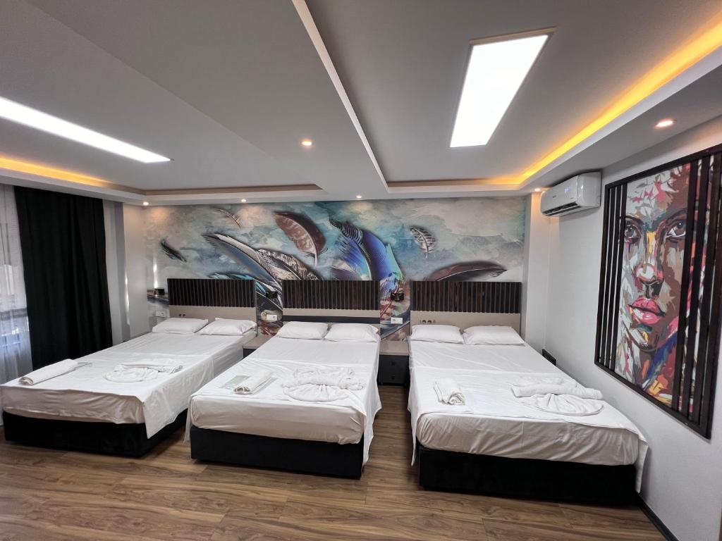 Krevet ili kreveti u jedinici u okviru objekta HOTEL by Samarkand travel agency