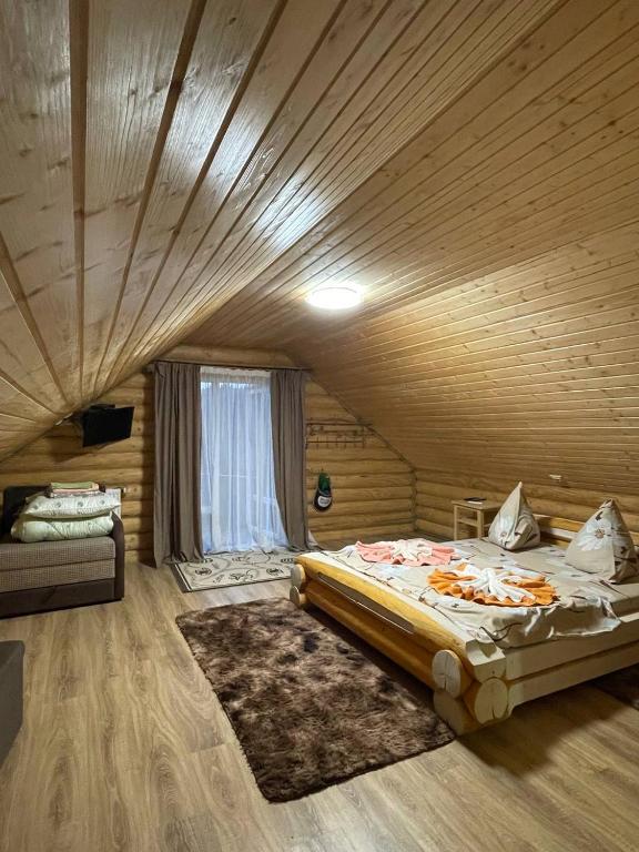 Postel nebo postele na pokoji v ubytování Cottage in Yasinya