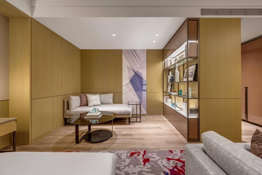 Postel nebo postele na pokoji v ubytování Kaohsiung Marriott Hotel