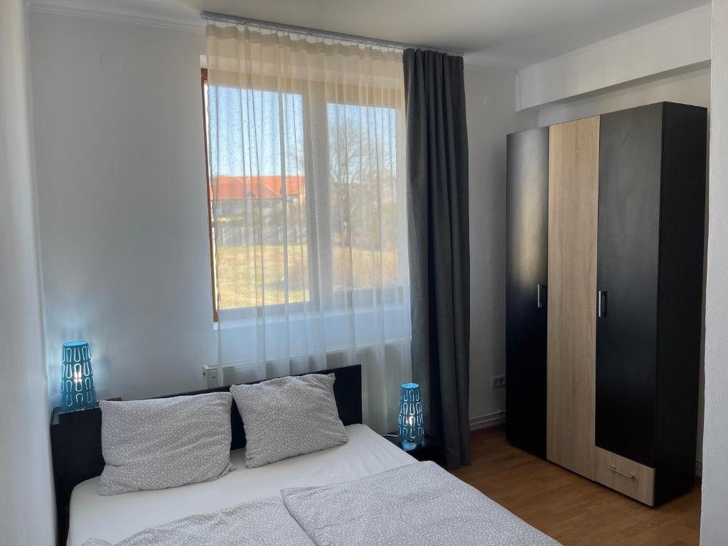 Postel nebo postele na pokoji v ubytování Cassa-Grande