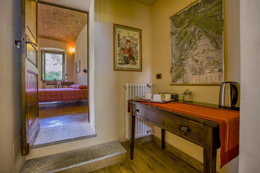 Postel nebo postele na pokoji v ubytování B&B Cascina Moncrava