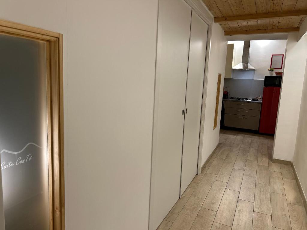Kuchyň nebo kuchyňský kout v ubytování Suite Contè