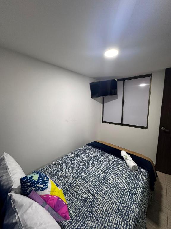 Postel nebo postele na pokoji v ubytování HOSPEDAJE SARY HOUSE