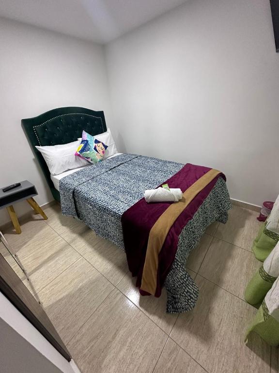 Postel nebo postele na pokoji v ubytování HOSPEDAJE SARY HOUSE