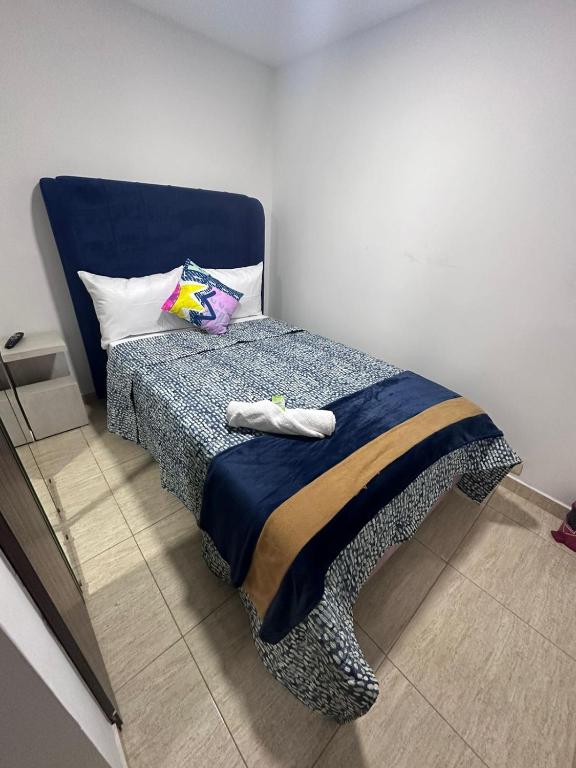 Postel nebo postele na pokoji v ubytování HOSPEDAJE SARY HOUSE