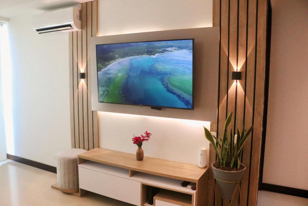 TV a/nebo společenská místnost v ubytování Atlantis Suites BAQ -Apartamento Moderno-2-BD