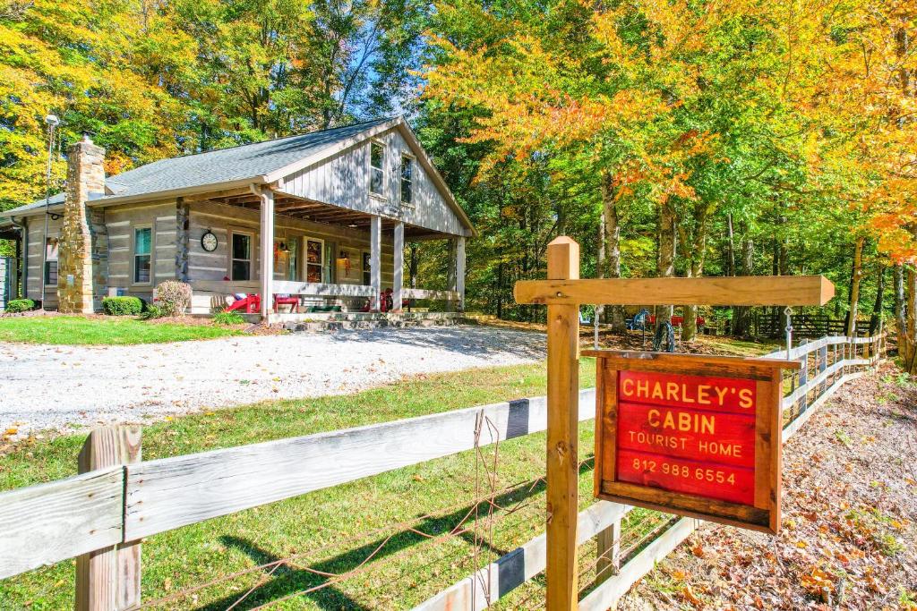 a sign in front of a farm house at Charleys Cabin in Nashville