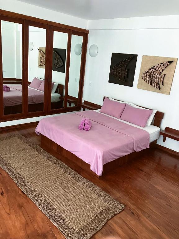 Postel nebo postele na pokoji v ubytování Villa Formosa Panglao