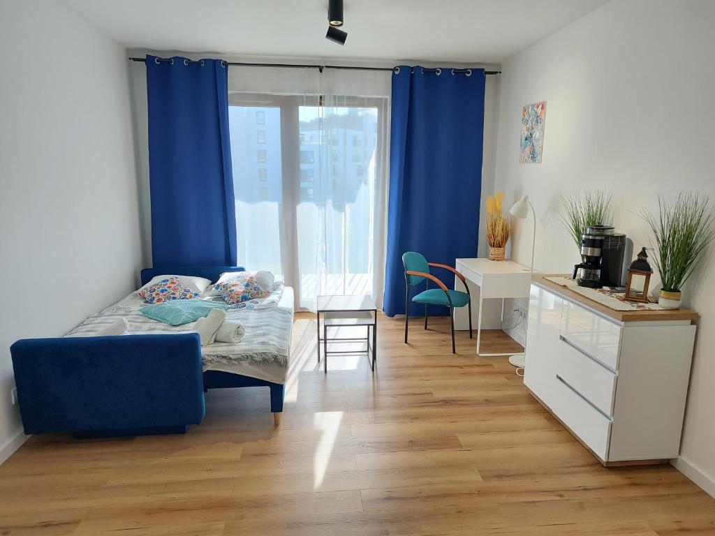Fotografia z galérie ubytovania Uroczy apartament z miejscem na auto w garażu vo Varšave