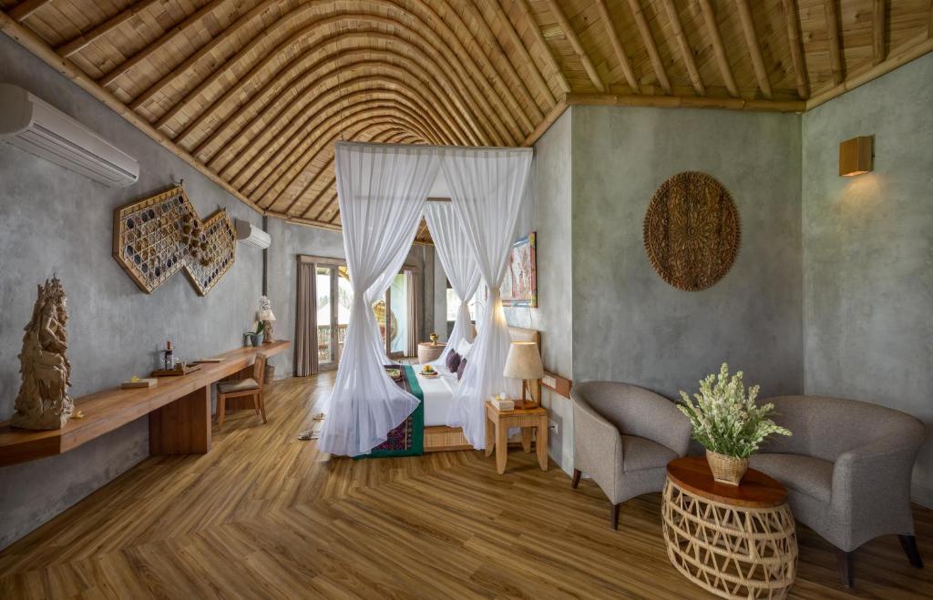 Posezení v ubytování TheWakanda Resort A Pramana Experience