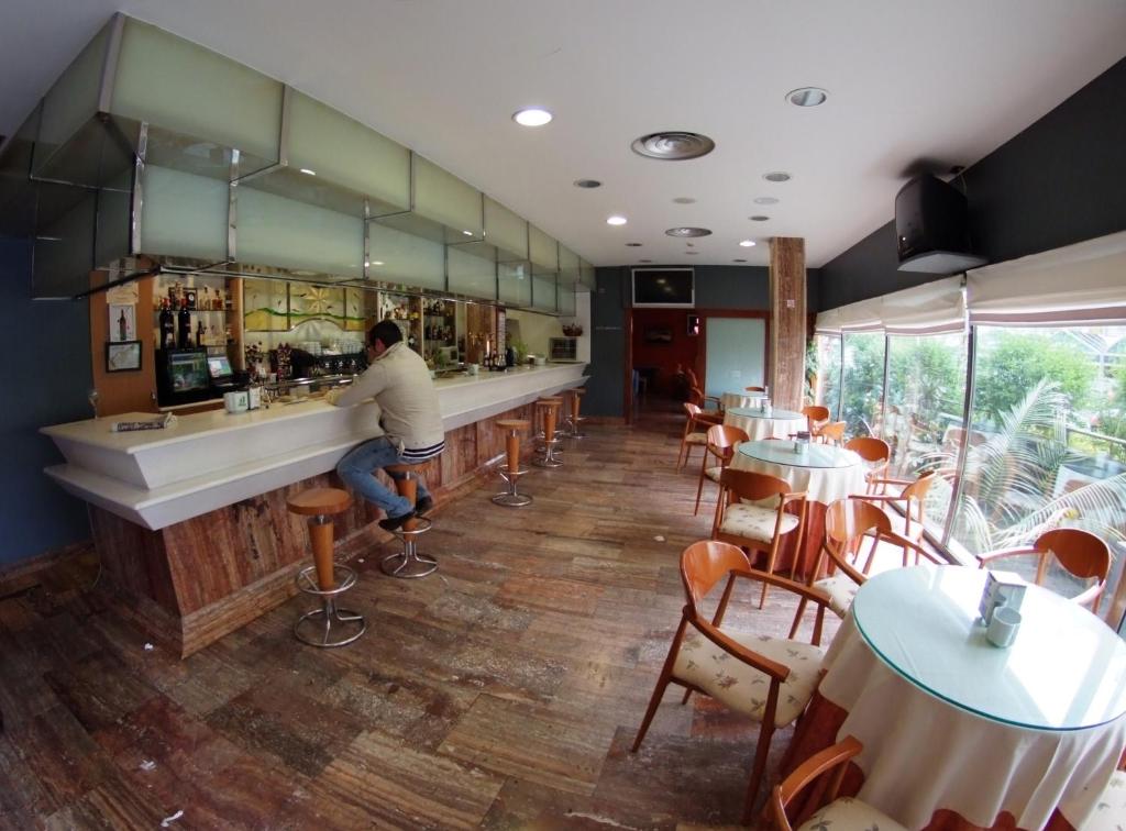 Un restaurante o sitio para comer en Hotel Estrella Norte