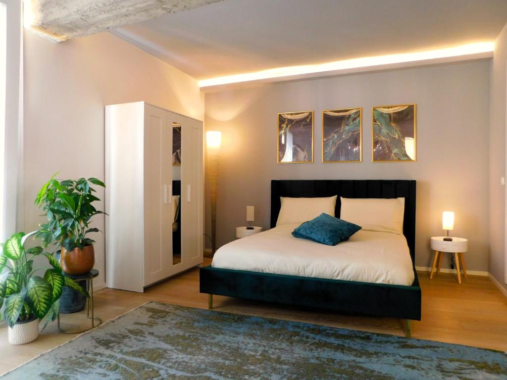 מיטה או מיטות בחדר ב-Piazza Maggiore Santa Margherita b&b