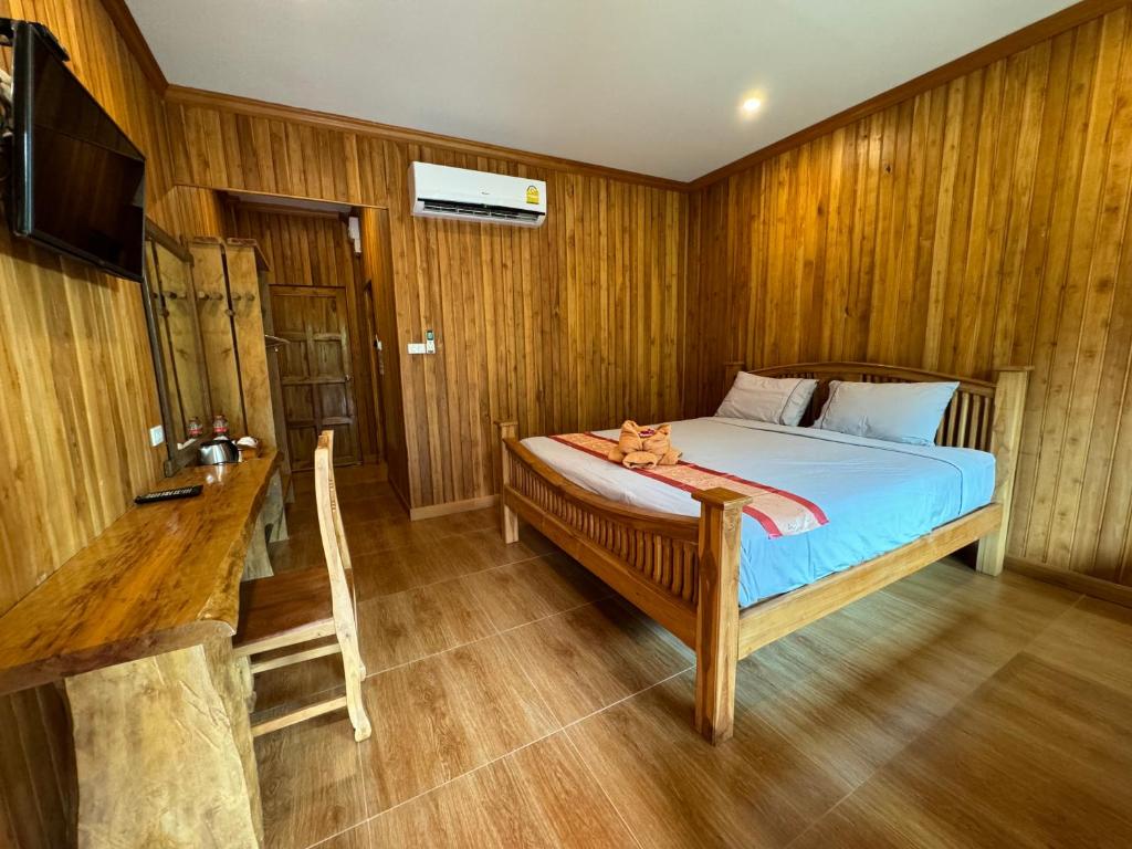 Postel nebo postele na pokoji v ubytování Samed Garden Resort