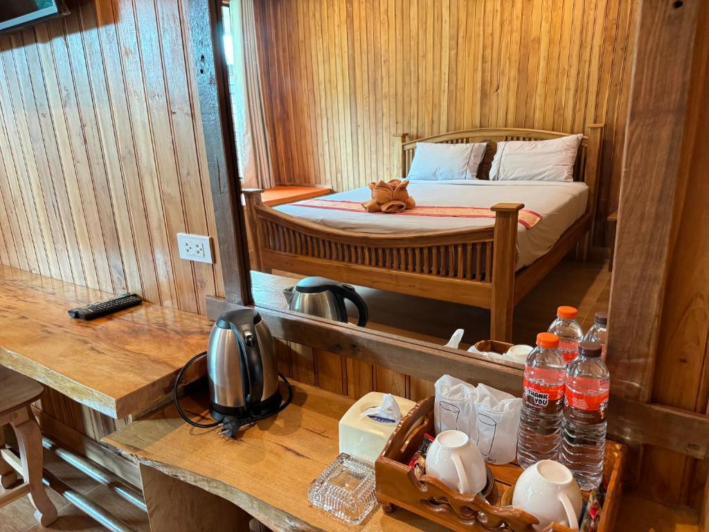 Postel nebo postele na pokoji v ubytování Samed Garden Resort