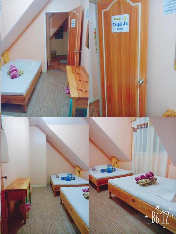 Postel nebo postele na pokoji v ubytování TRIPLE JS INN-SAGADA