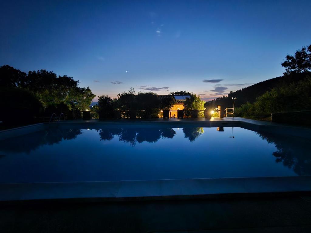 The swimming pool at or close to Villa delle lucciole