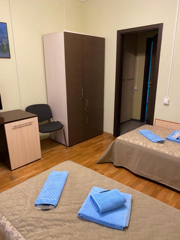 Postel nebo postele na pokoji v ubytování Hotel Obolon-Arena