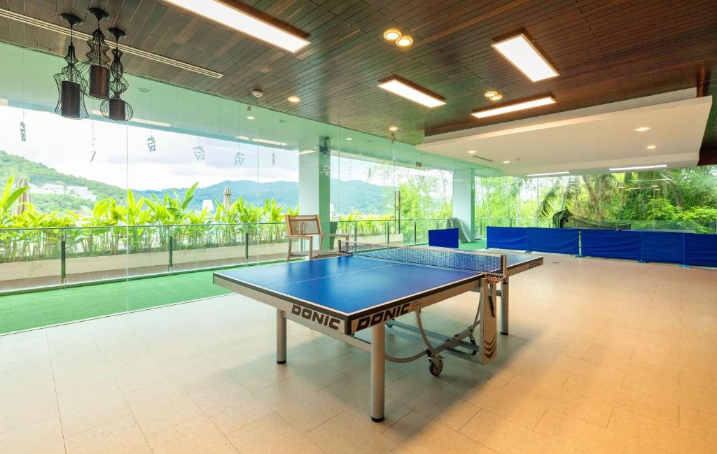 Stolní tenis v ubytování Rudi Condo by Q Conzept nebo okolí