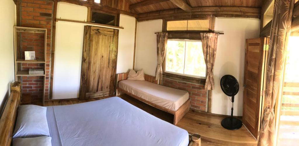 Postel nebo postele na pokoji v ubytování Quinta El Mamey