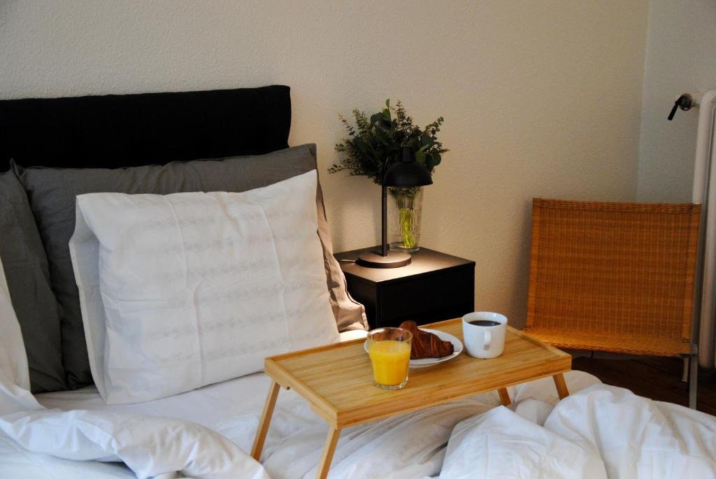 Postel nebo postele na pokoji v ubytování Aparthotel Mageløs 12