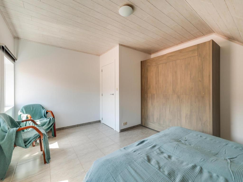 Postel nebo postele na pokoji v ubytování In de Wollekjes